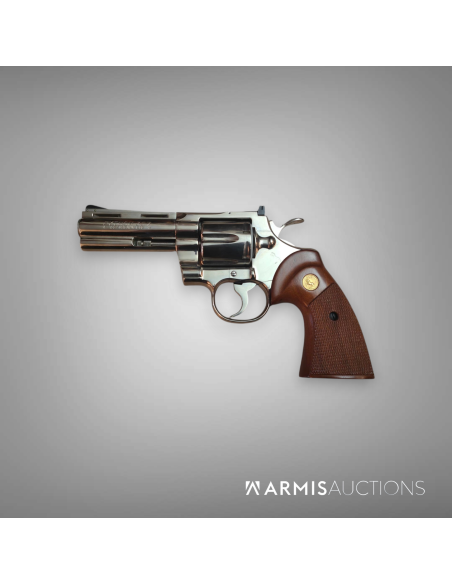 Revolver Colt Python . 357 4 pouces nickel en coffret (1975) Revolver Colt Python . 357 4 pouces nickel en coffret (1975)