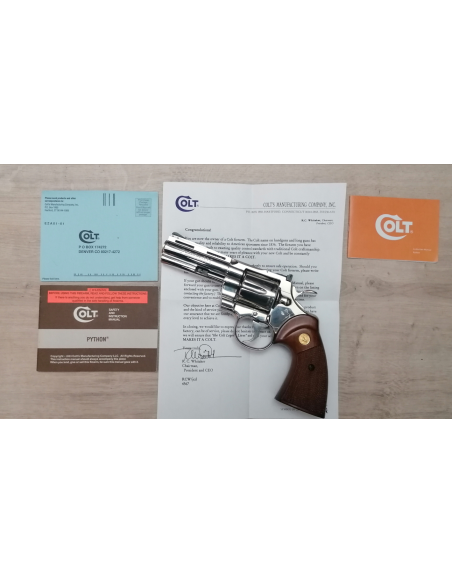 Revolver Colt Python . 357 4 pouces nickel en coffret (1975) Revolver Colt Python . 357 4 pouces nickel en coffret (1975)